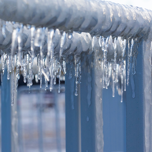 ice hanging from a roof